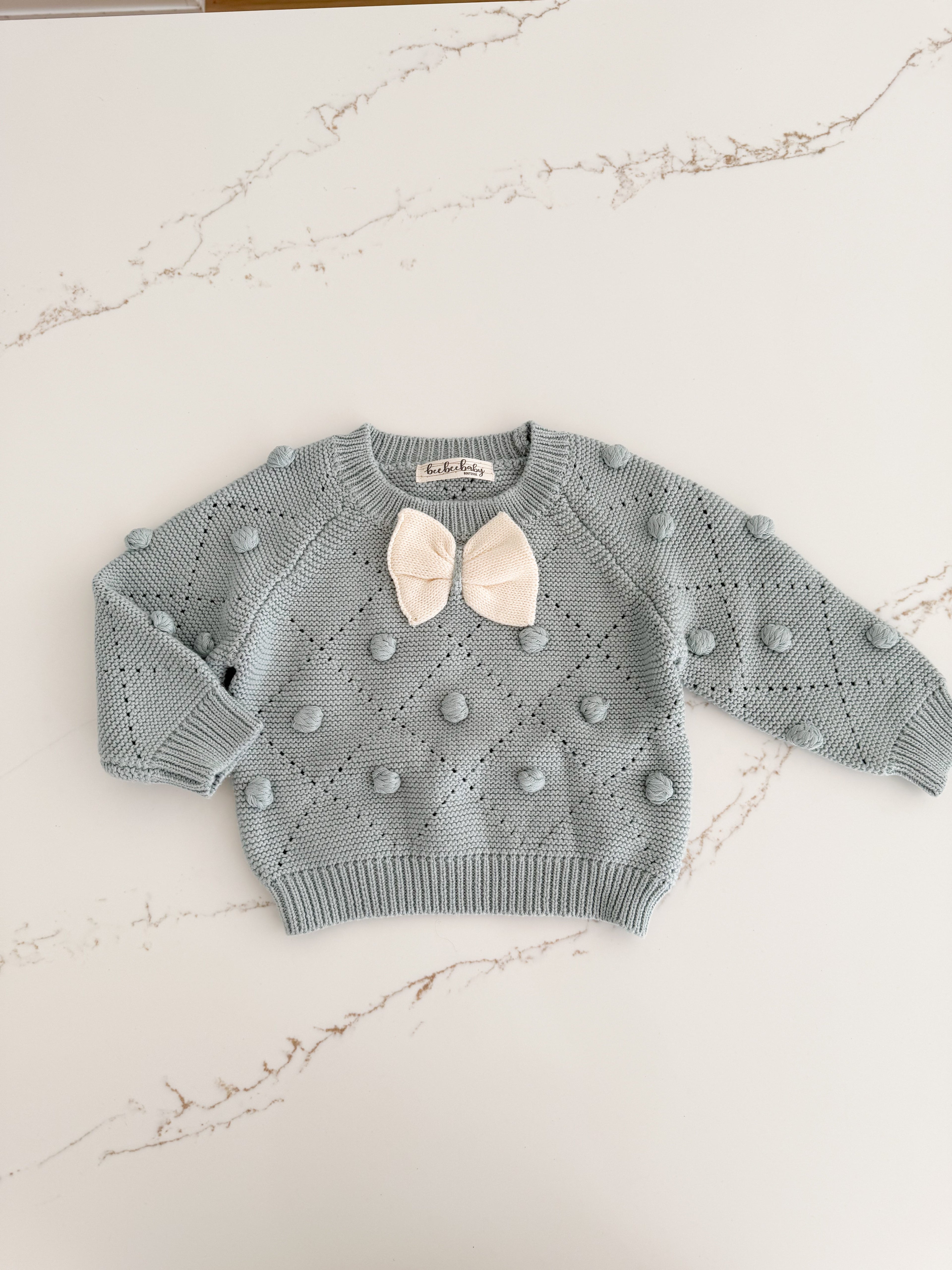 Pom Pom Knit Sweater