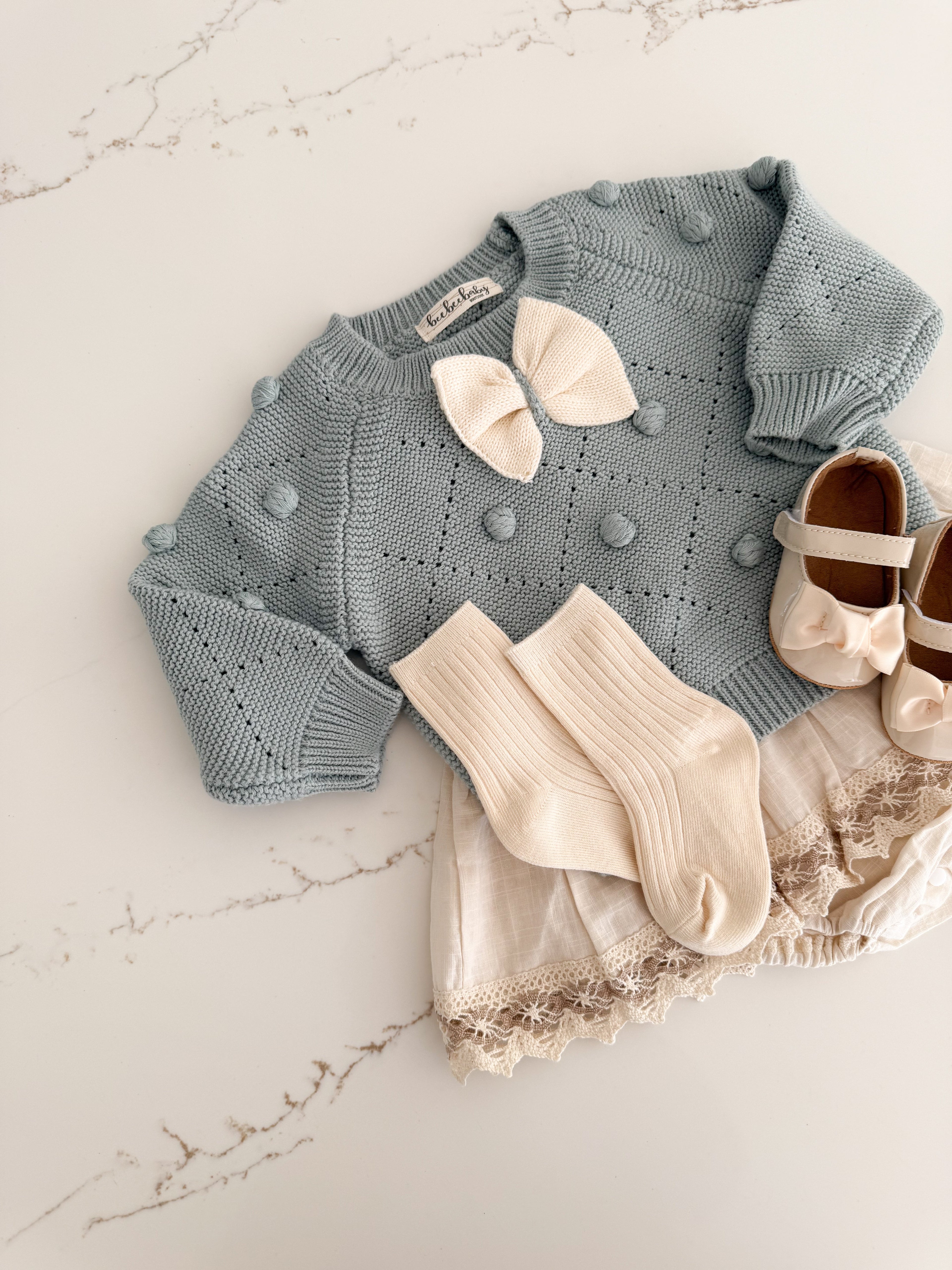 Pom Pom Knit Sweater