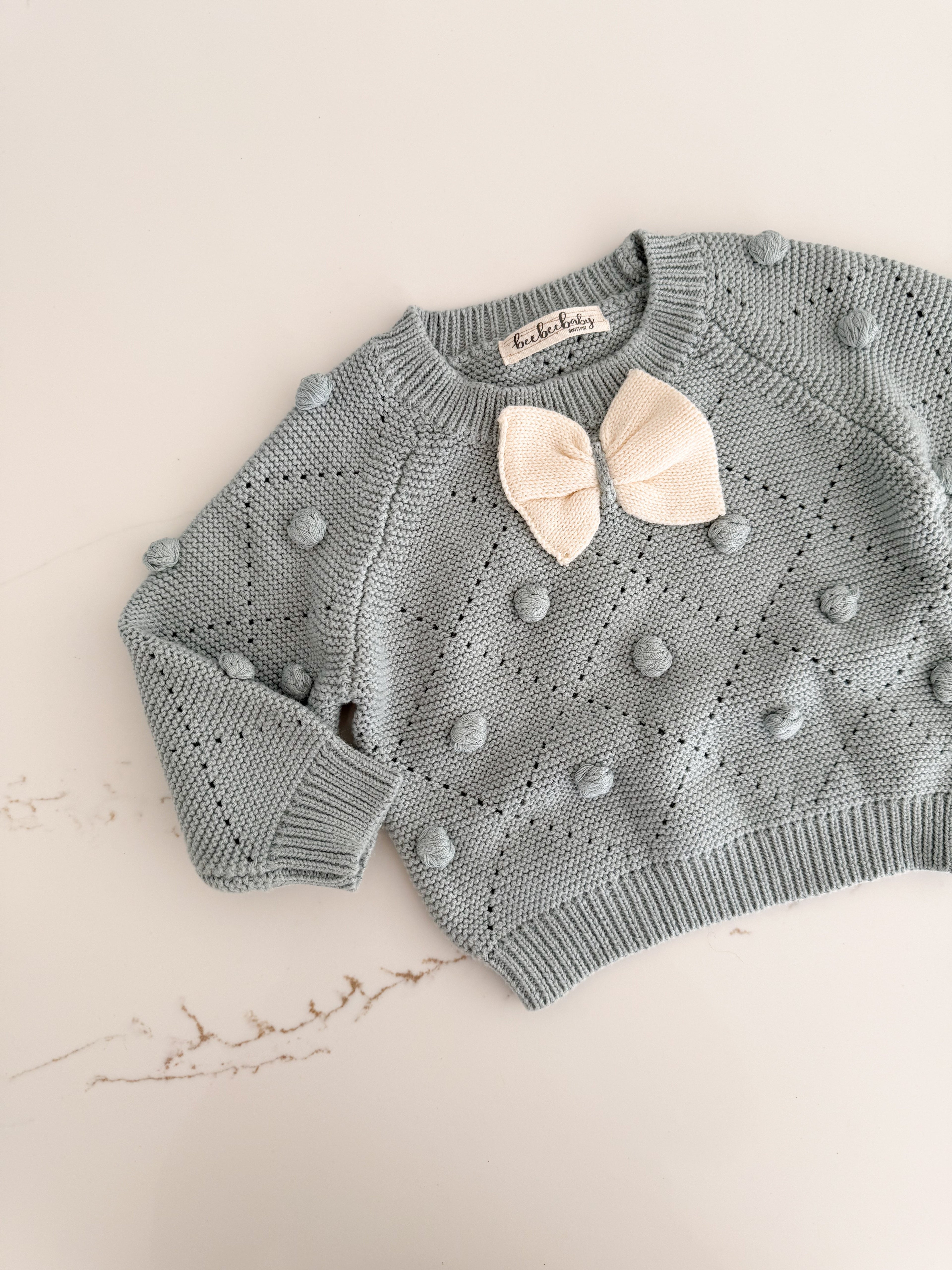 Pom Pom Knit Sweater